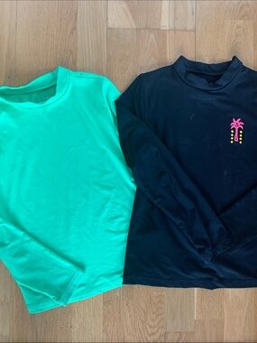 Girls rash guards. Size M.
